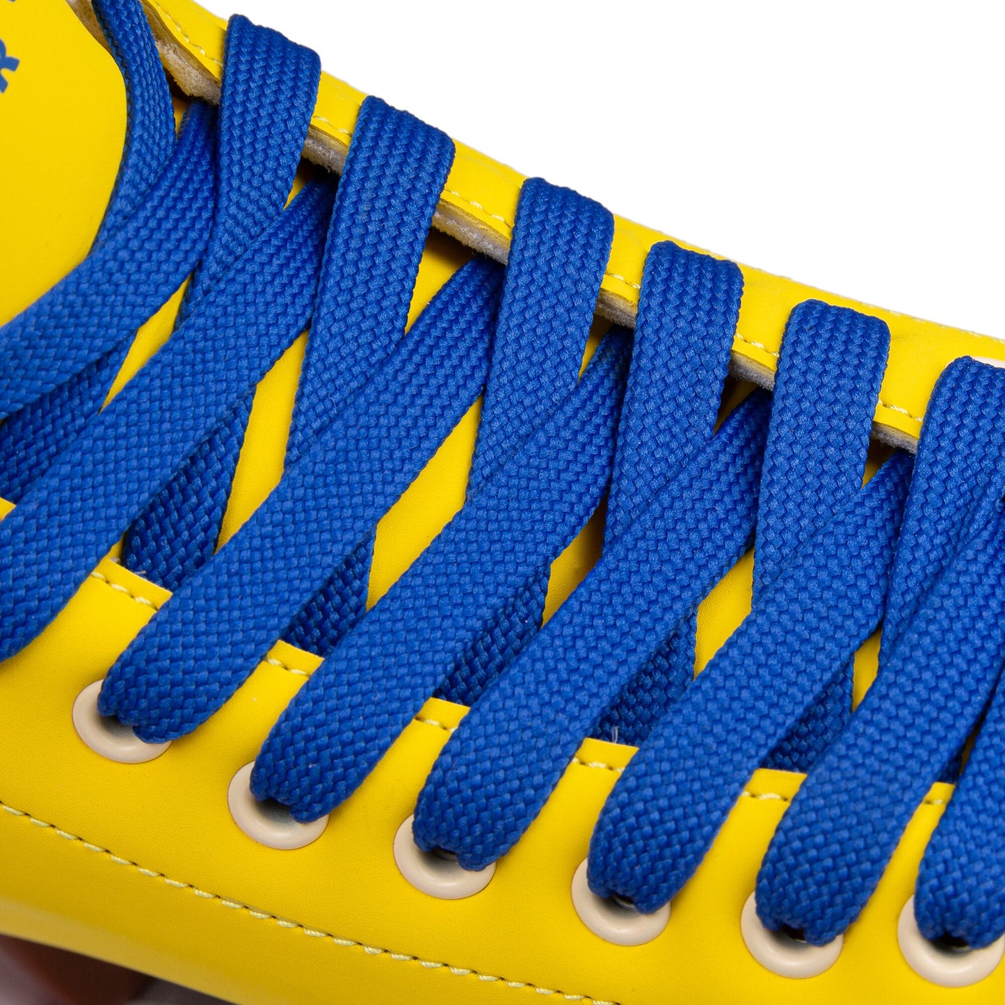 Detailed view of the lacing system on a Chaya Deluxe NO WAR roller skate, highlighting the strength and style of the laces.