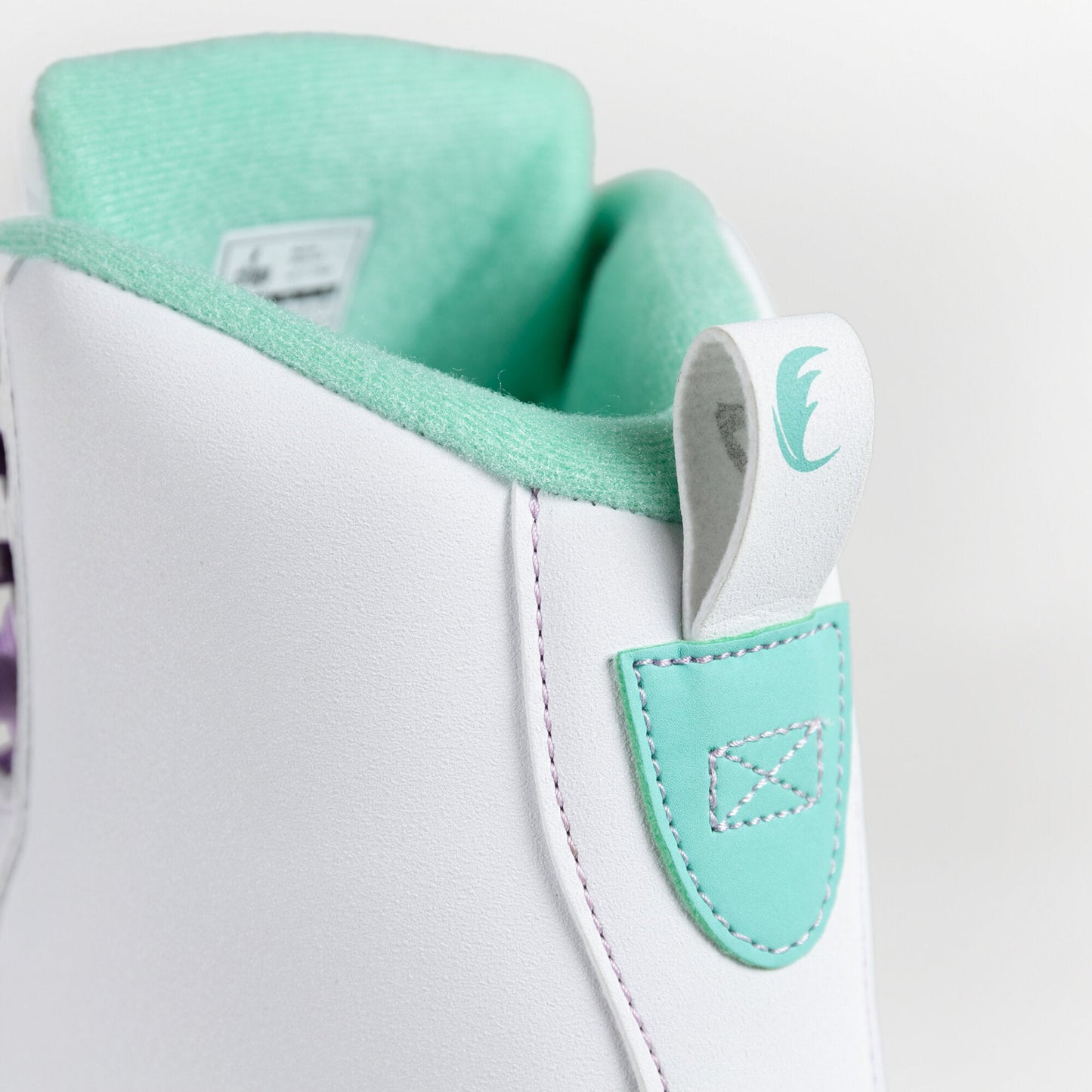 Close-up of the Chaya Melrose White skate's ankle opening, highlighting the clean white collar and internal padding designed for comfortable entry.