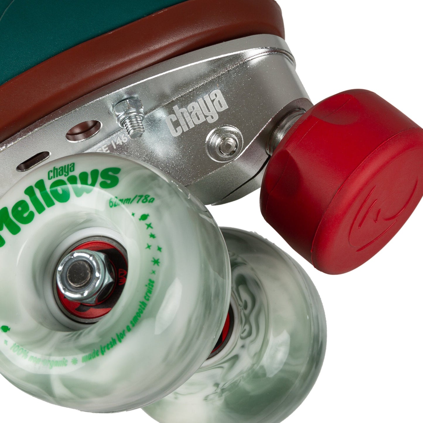 Close-up of the wheels and toe stop on the Chaya Melrose Premium Juniper Green quad skate, highlighting their robust construction.