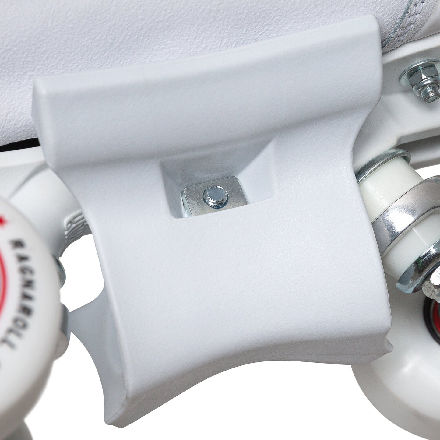 Close-up on the asymmetric grind block integrated into the Chaya Ragnaroll skate, showcasing its unique contour for park performance.