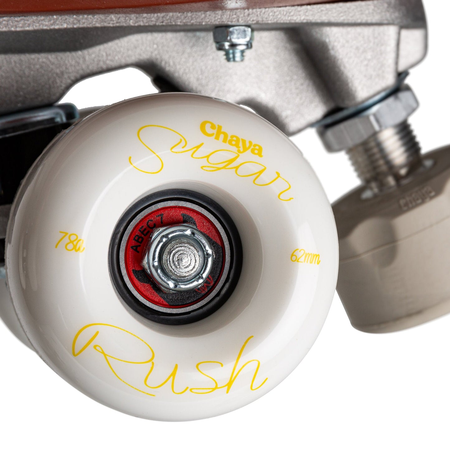 A wheel from the Chaya Melrose Deluxe Latte skate, showcasing its neutral tone and smooth rolling surface.