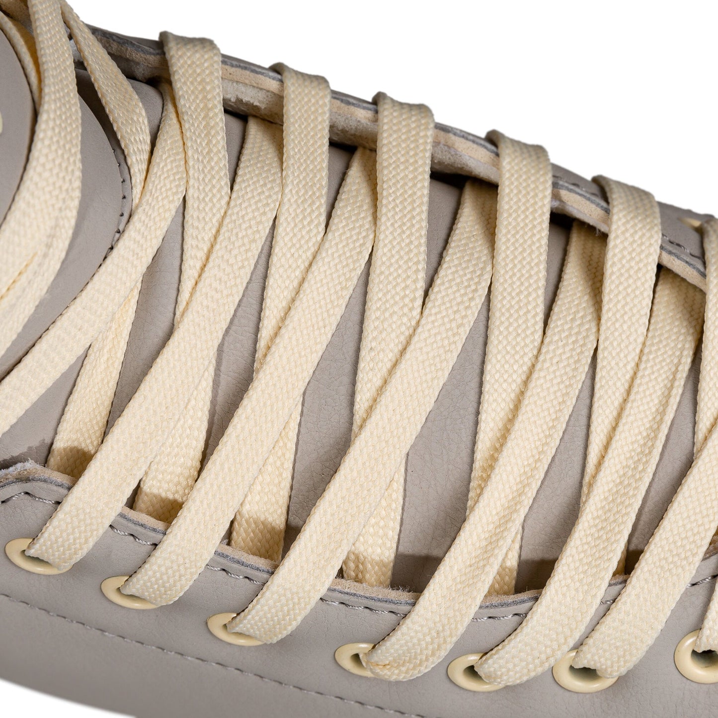 Detailed shot of the laces on a Chaya Melrose Deluxe Latte skate, showing their secure fit and harmonious color.