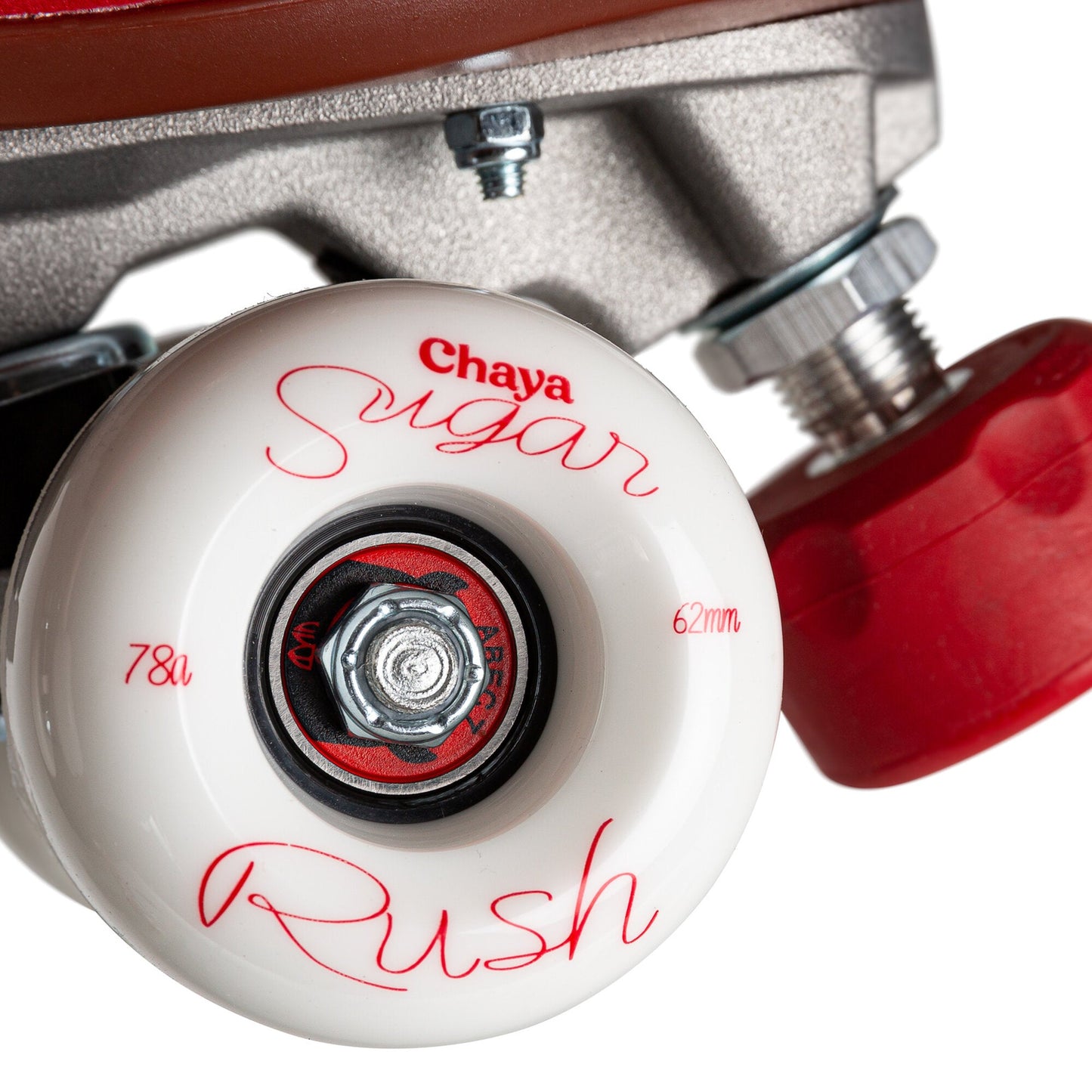 A wheel from the Chaya Melrose Deluxe Ruby skate, showcasing its vibrant red color and smooth rolling surface.