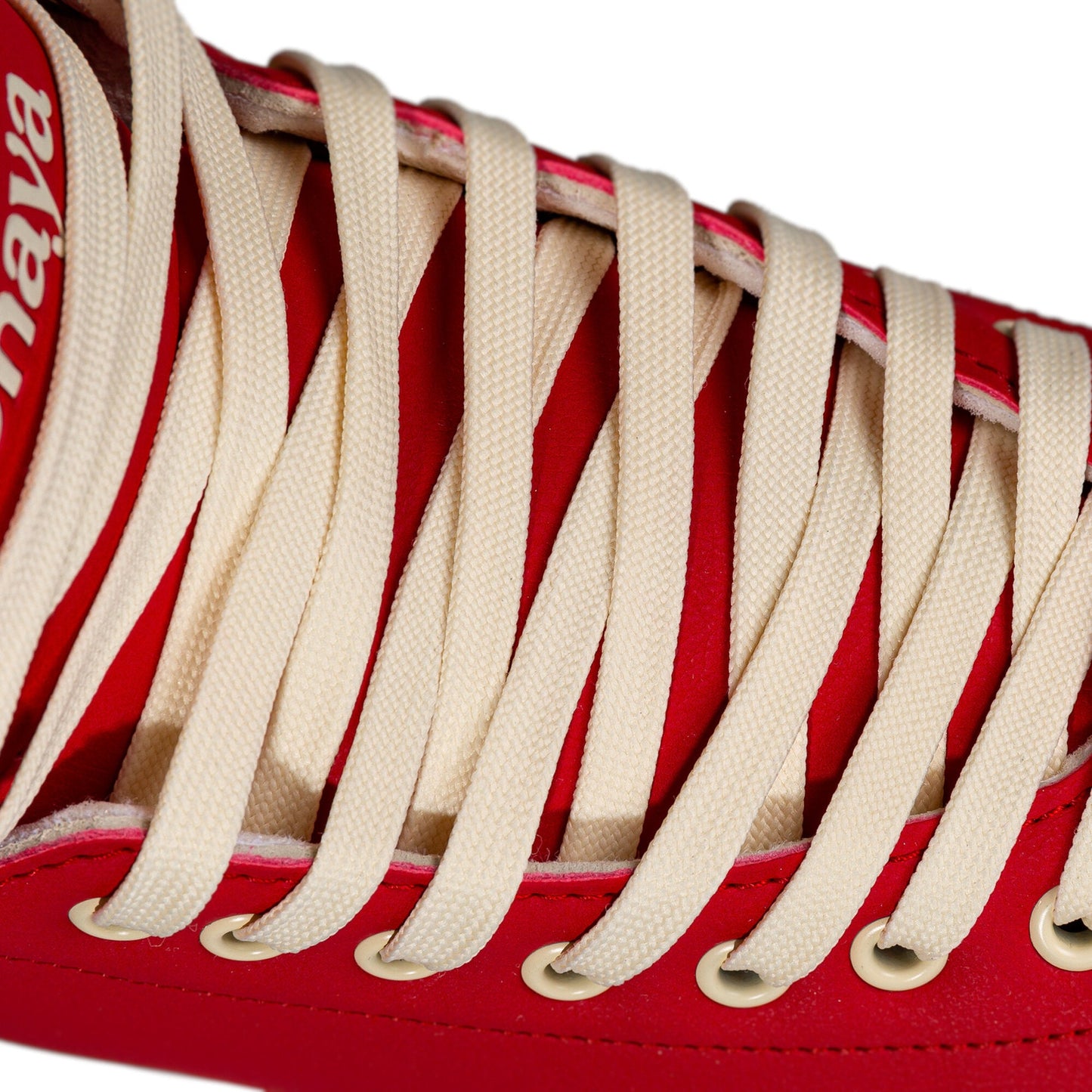 Close-up of the laces on a Chaya Melrose Deluxe Ruby skate, showing their texture against the boot.