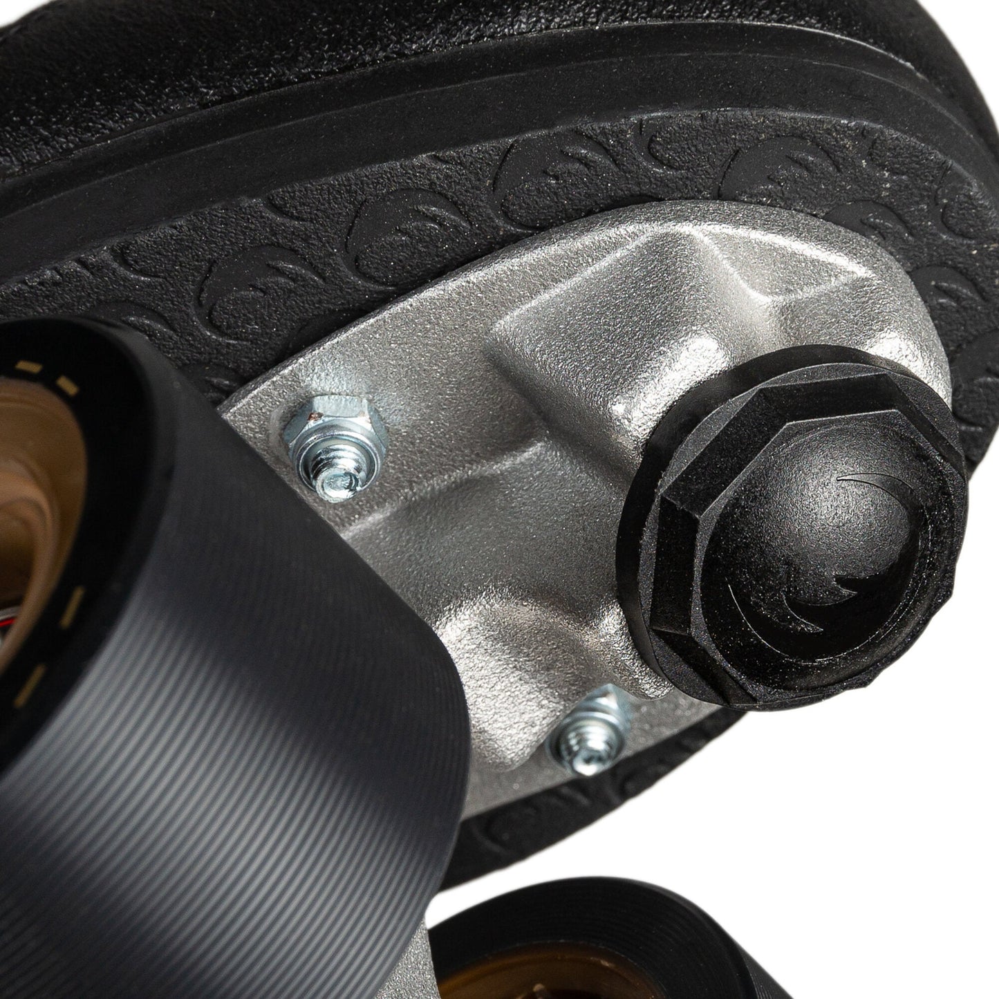 Close-up of a jam plug (or dance plug) on a roller skate, showing the small, flat component replacing a traditional toe stop for enhanced maneuverability.