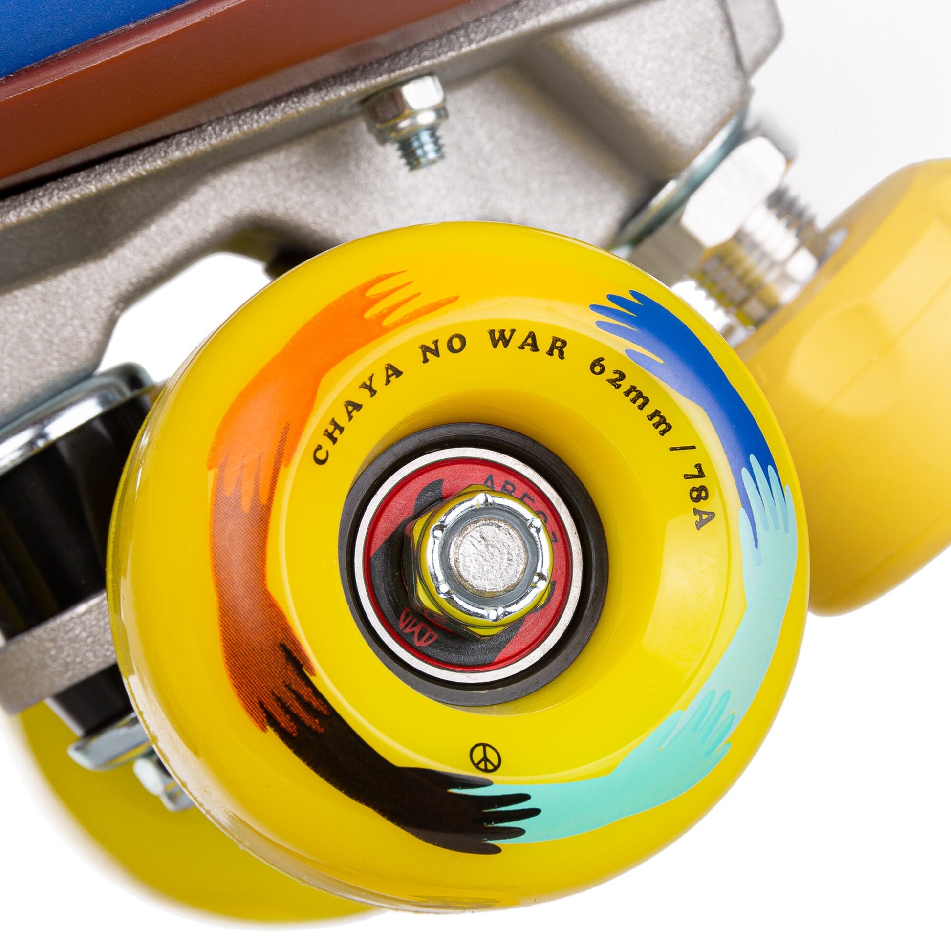Close-up of a wheel on a Chaya Deluxe NO WAR roller skate, highlighting its design, color, and any unique markings.