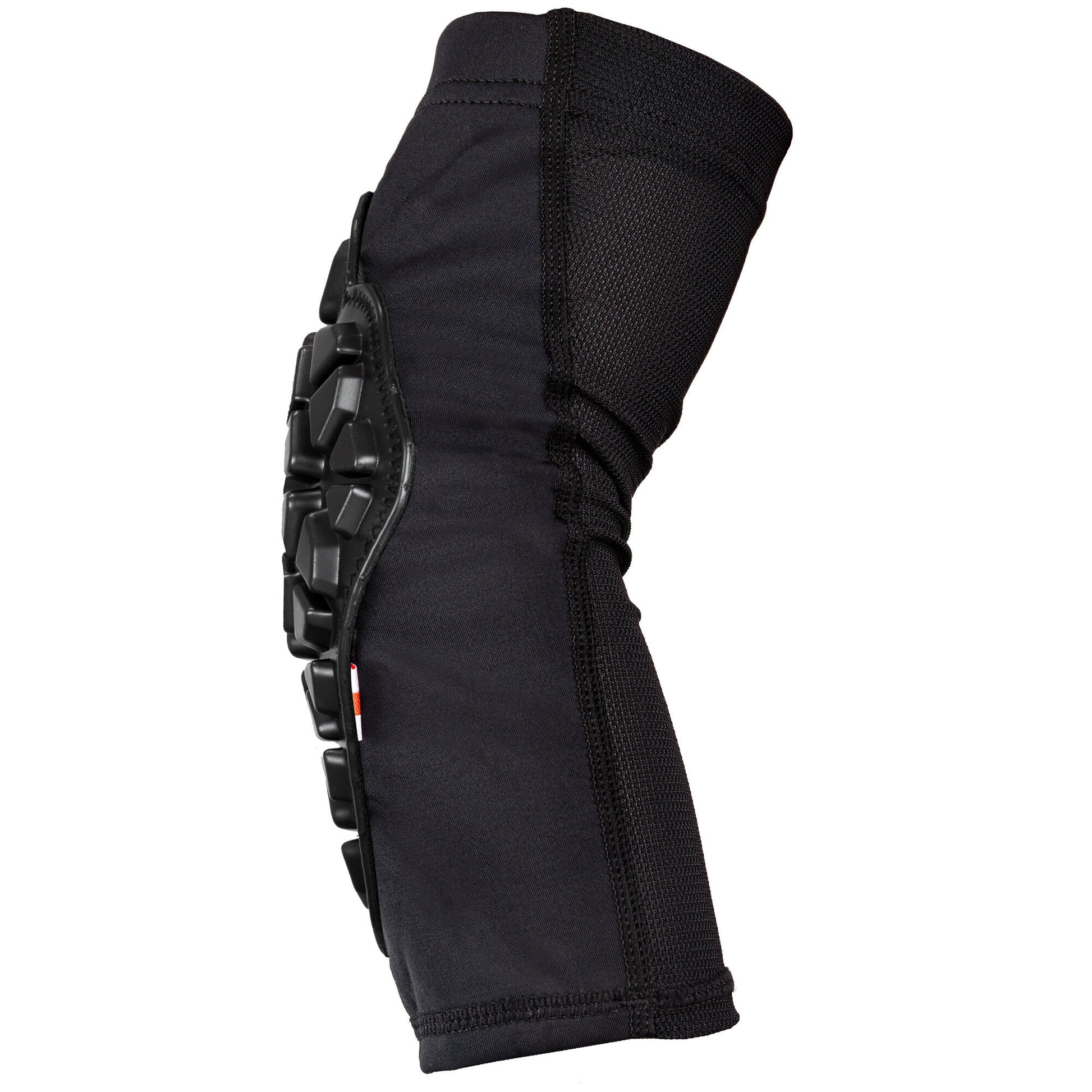 Side view of the ENNUI Shock Sleeve Elbow Gasket, showing its slim, contoured profile designed to conform discreetly to the arm, with the flexible fabric concealing the protective padding.