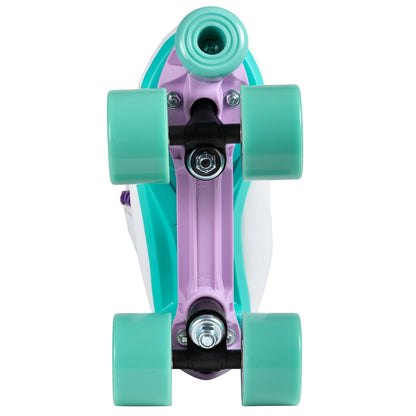 The underside of a Chaya Melrose White skate, detailing the robust plate, durable trucks, and its perfectly color-matched toe stop.
