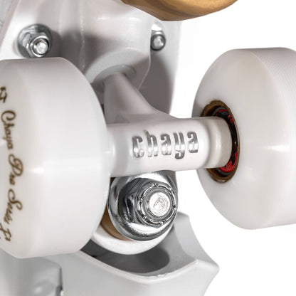 Close-up of the hanger on the Chaya Kismet Barbiepatin Gold roller skate, detailing its construction and connection to the trucks.