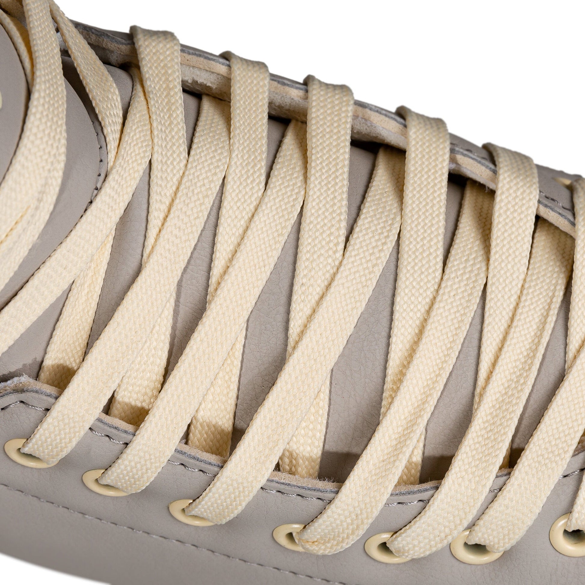 Detailed shot of the laces on a Chaya Melrose Deluxe Latte skate, showing their secure fit and harmonious color.