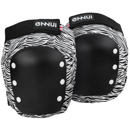 Front view of the ENNUI Aly Knee Pad Zebra pair, featuring a durable hard cap and a distinctive zebra print design. Ideal for aggressive inline skating and skateboarding, offering robust impact protection and unique style